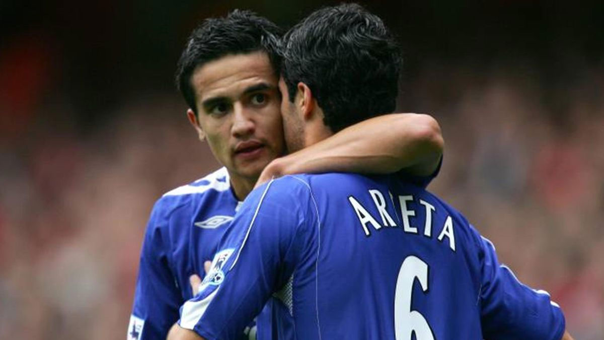 Tim Cahill and Mikel Arteta of Everton