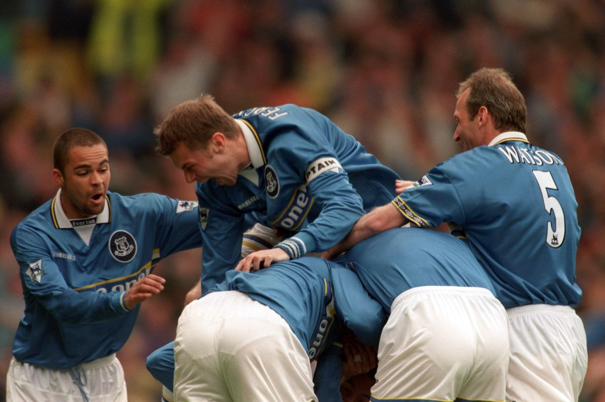 Gareth Farrelly is mobbed by his team-mates after scoring a priceless goal against Coventry City